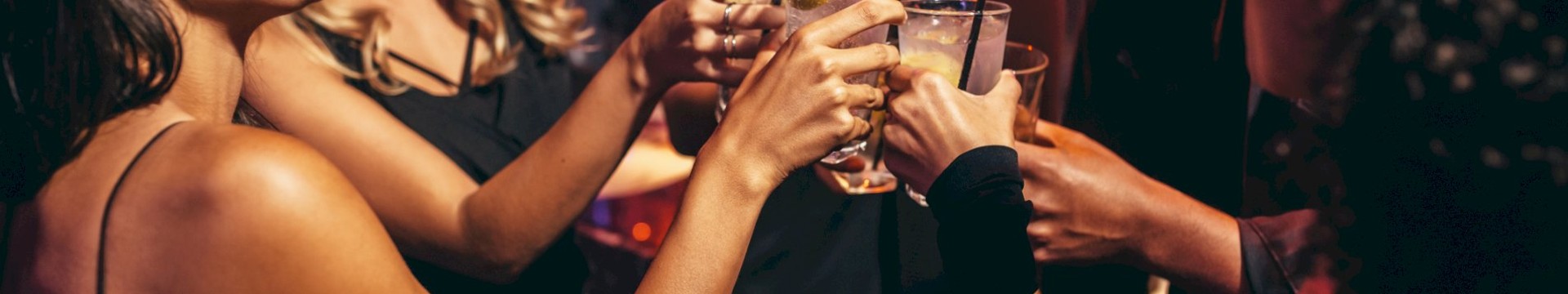 a group of girls toasting on a hen do