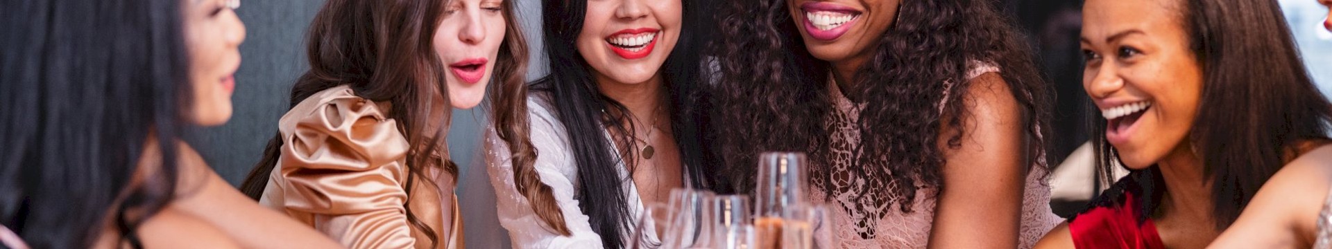 A group of ladies toasting on a hen party