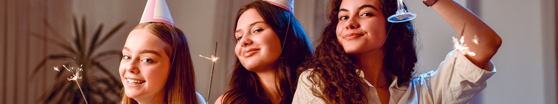 Three ladies enjoying drinks on their hen do.