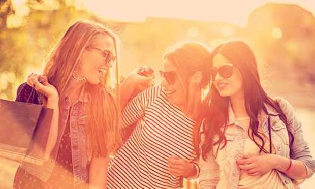Three girls laughing in the sun. Explore our Daytime Activities for your hen weekend: