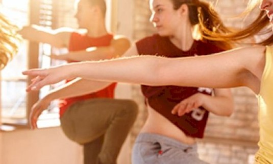 Six ladies taking part in a dance class