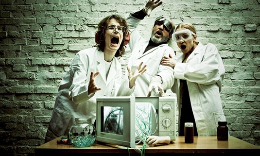 Three ladies taking part in an escape room.