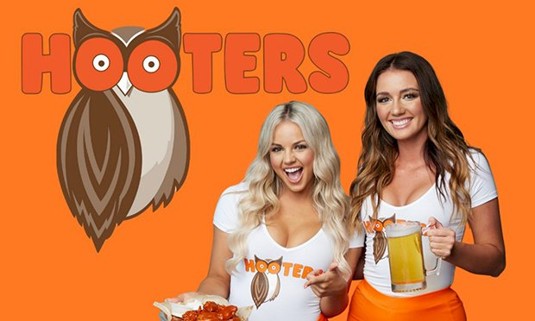 An image representing Hooters with two girls in hooters uniforms