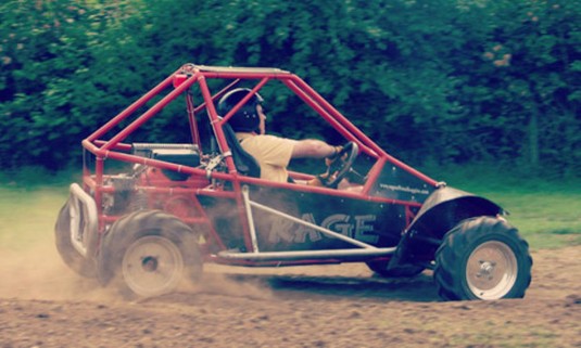 Hen driving a Rage Buggy