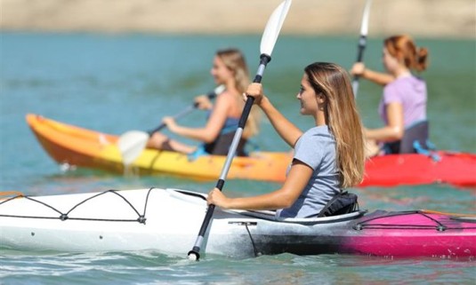 Friends on a hen do kayaking activity