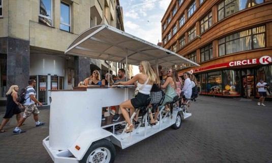 A group of girls on a group bike tour of paris