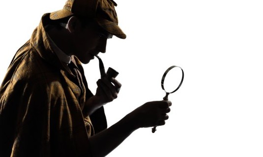 An actor in a detective costume, posing as a part of an immersive experience